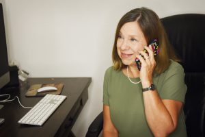 Debbie-Tudor-on-the-phone